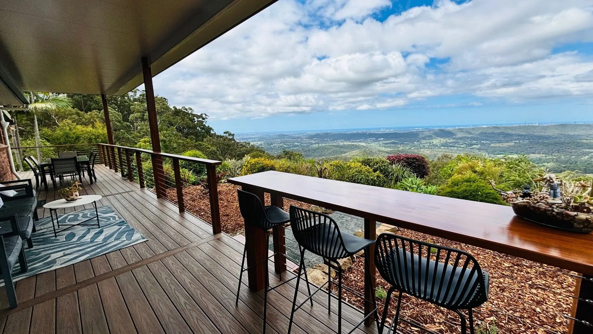 Wraparound verandah at Hillside House with sweeping coastal views