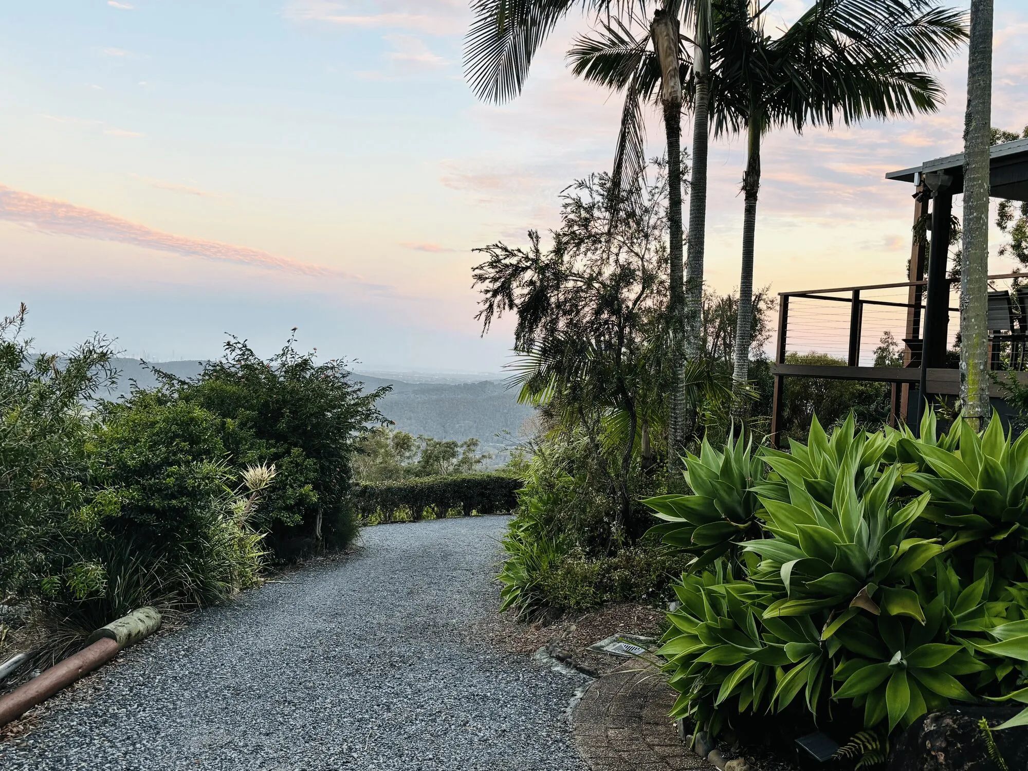 Gravel driveway approach at dusk