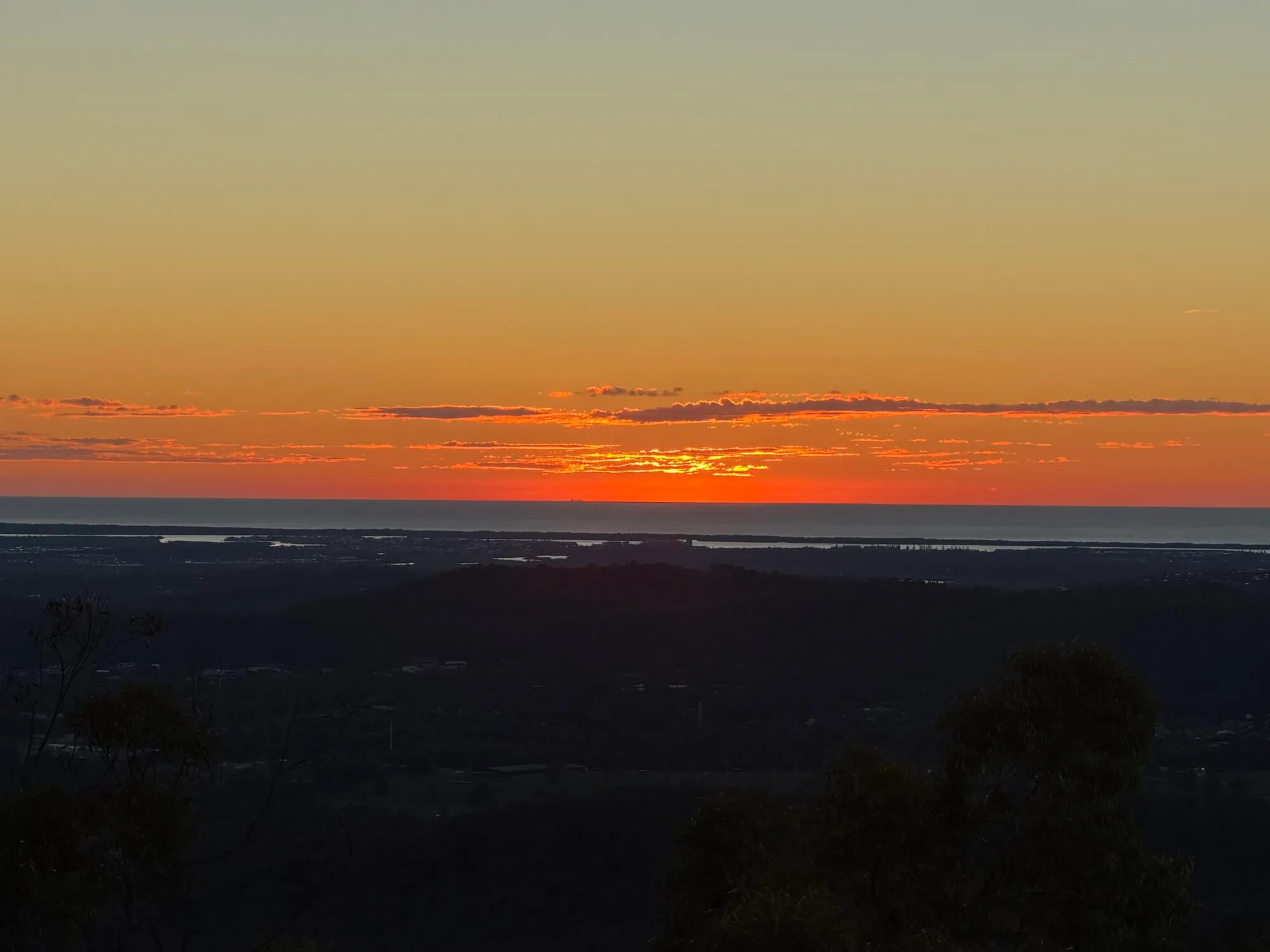 Sunset sky over the coastal hills