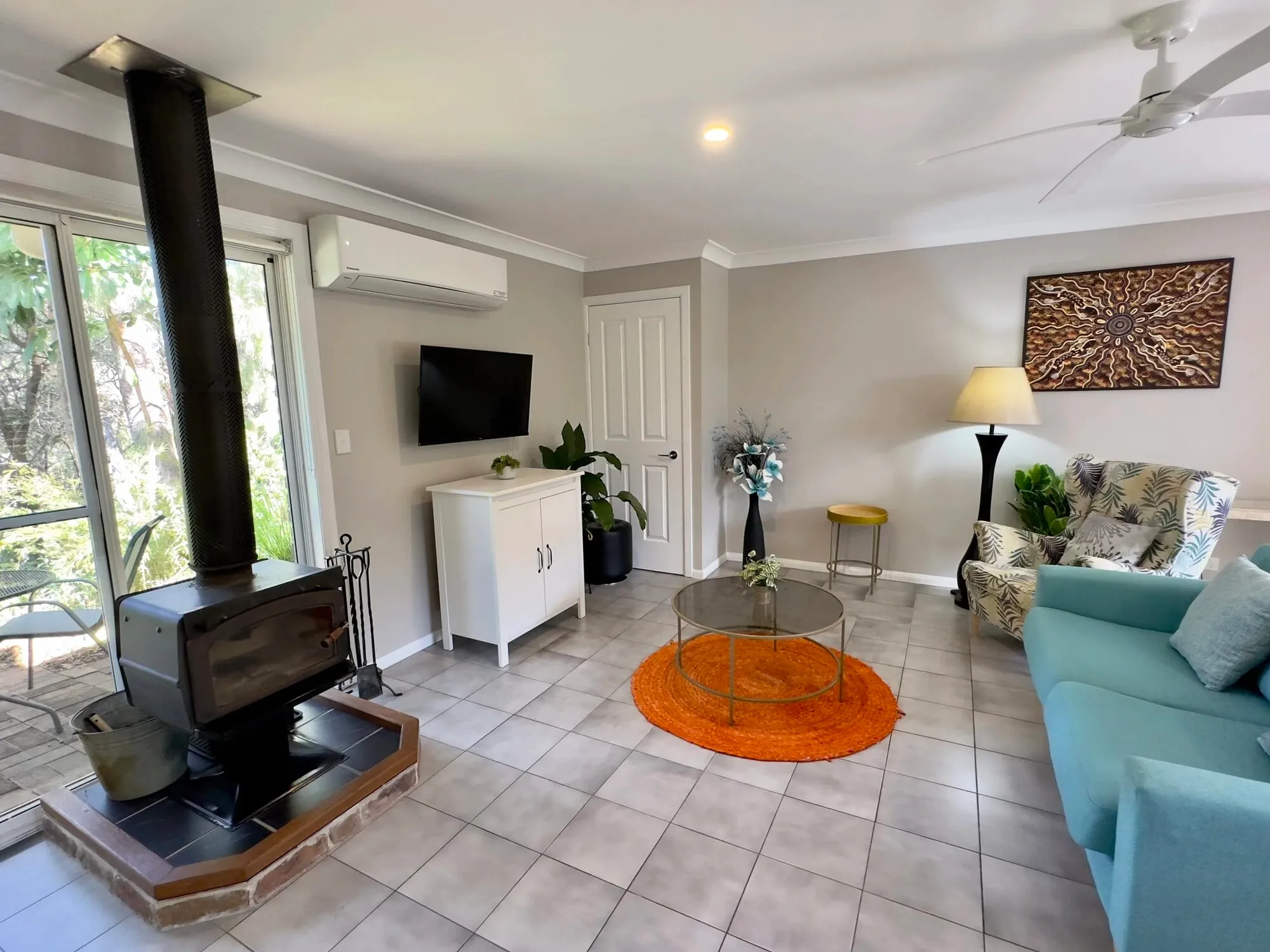 Villa lounge with wood burning fireplace